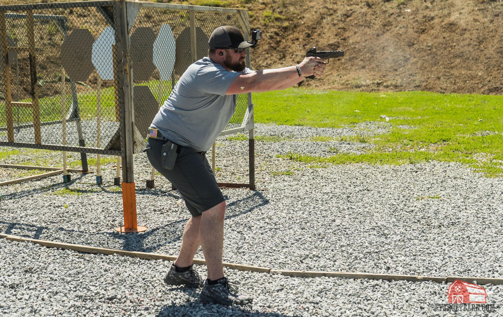 Practical shooting competitor moving through a stage